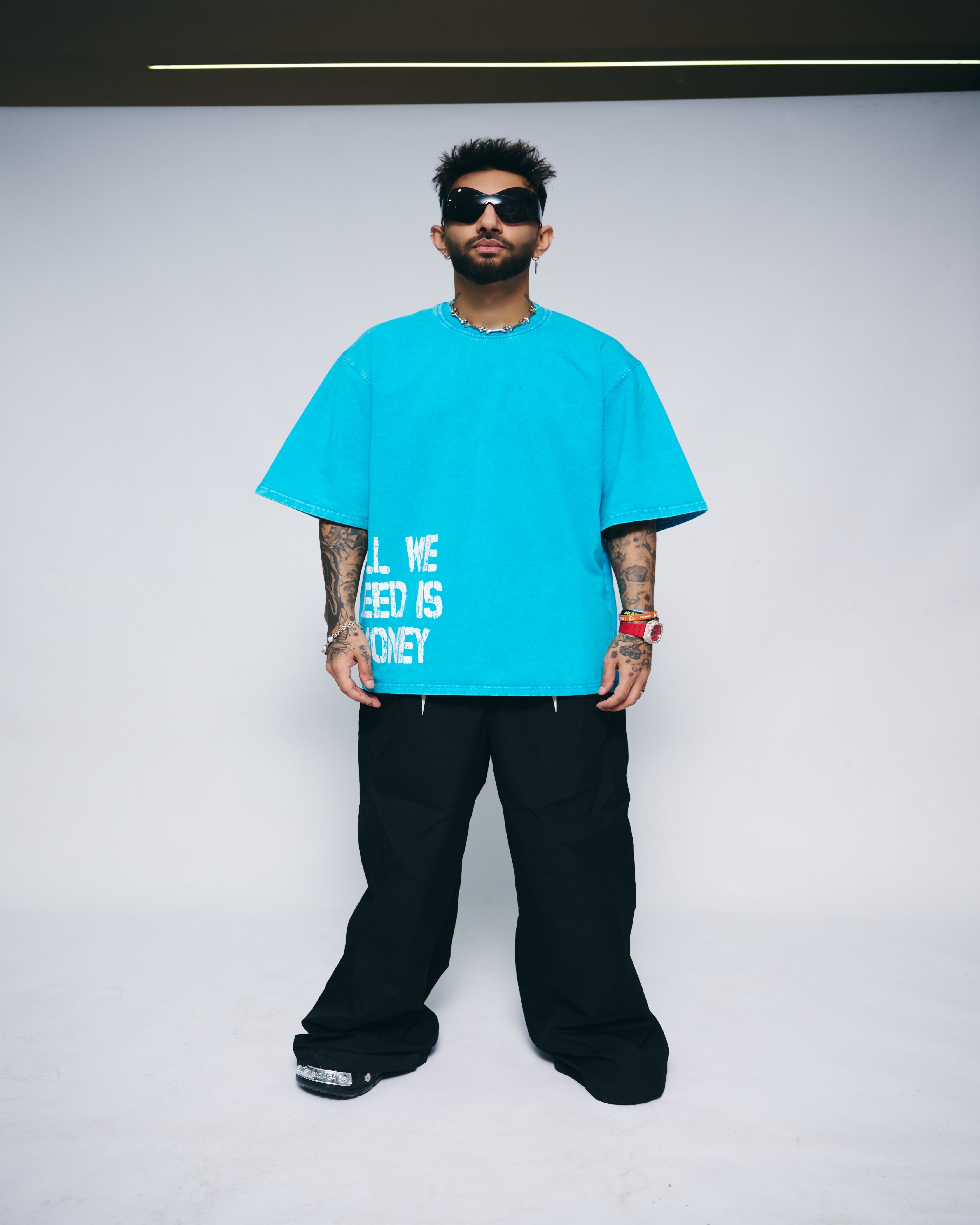 ALL WE NEED IS MONEY — AQUA WASH OVERSIZED TEE