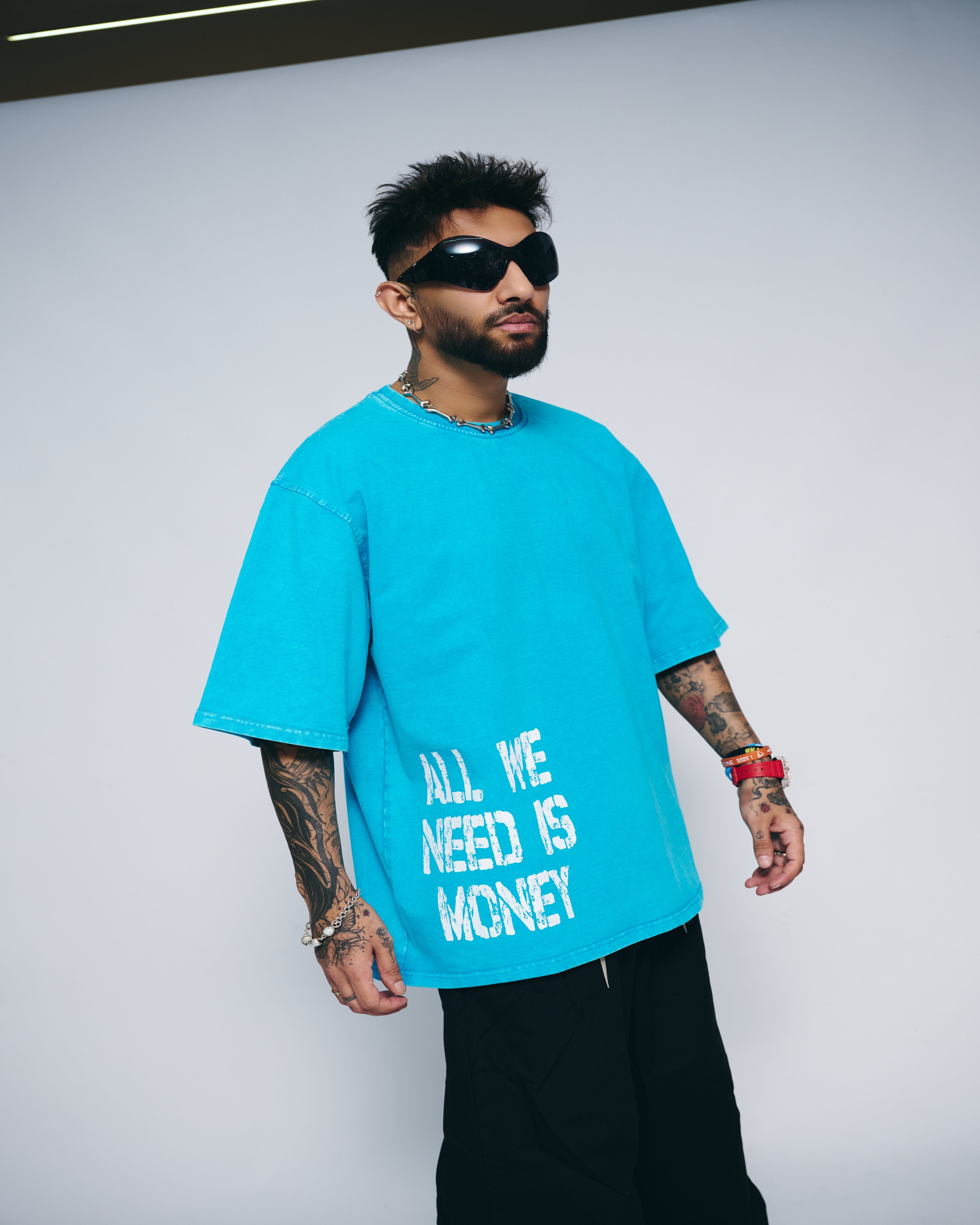 ALL WE NEED IS MONEY — AQUA WASH OVERSIZED TEE